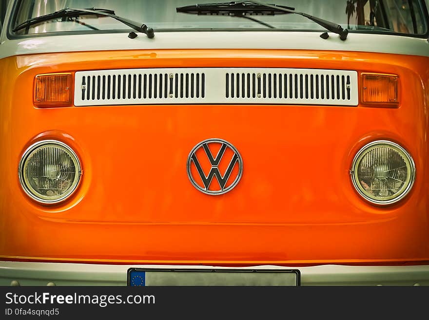 Orange Volkswagen Beatle Van