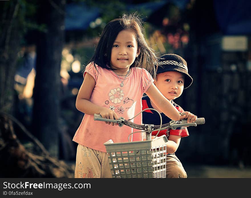 Children Riding Bicycle