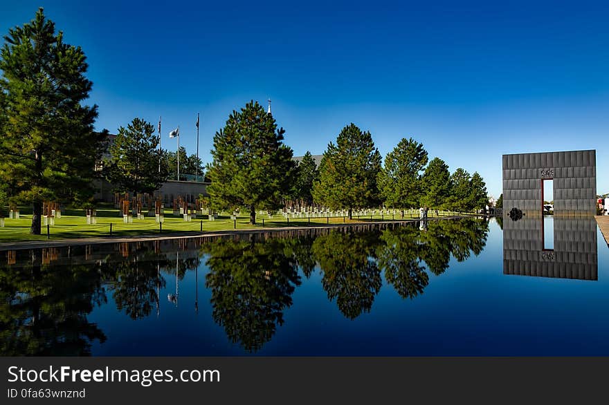 Oklahoma National City Memorial reflecting on lake, USA.