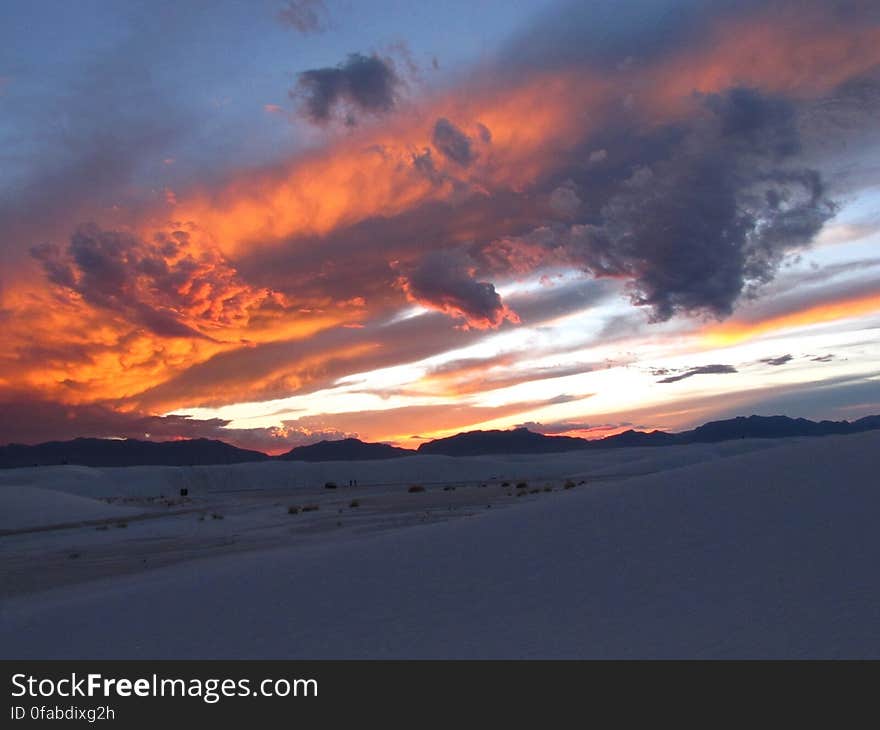 The sunset skies over a landscape. The sunset skies over a landscape.