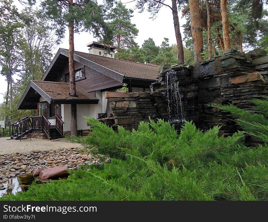 Houses by Trees Against Sky