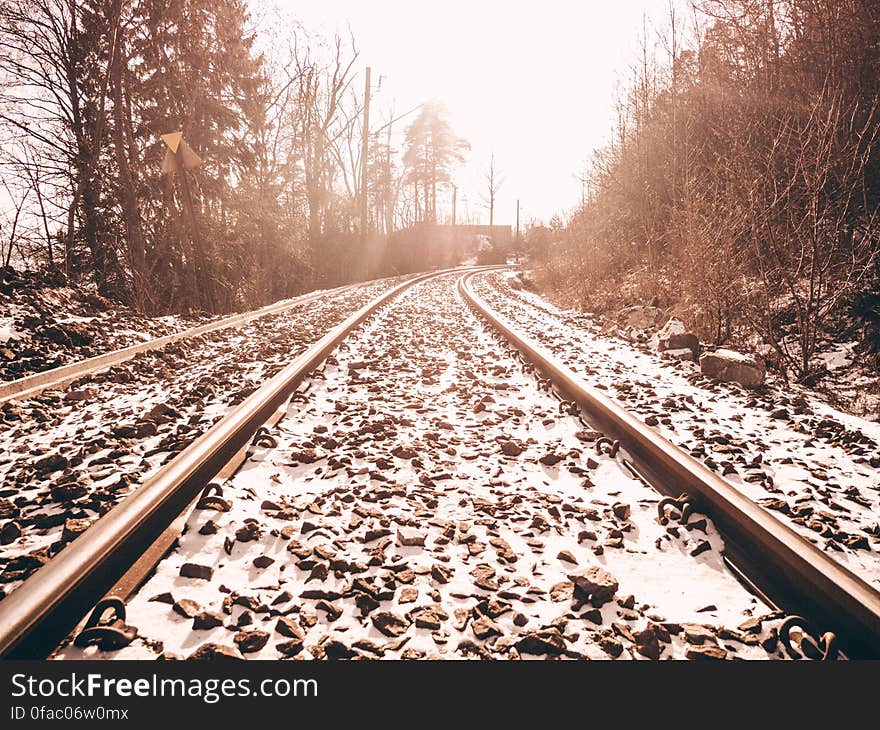 Railroad Tracks Against Sky during Winter