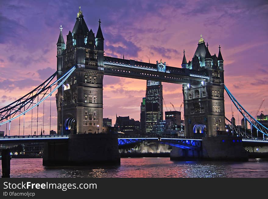 Tower of London Bridge over River Thames at sunset in London, England. Tower of London Bridge over River Thames at sunset in London, England.