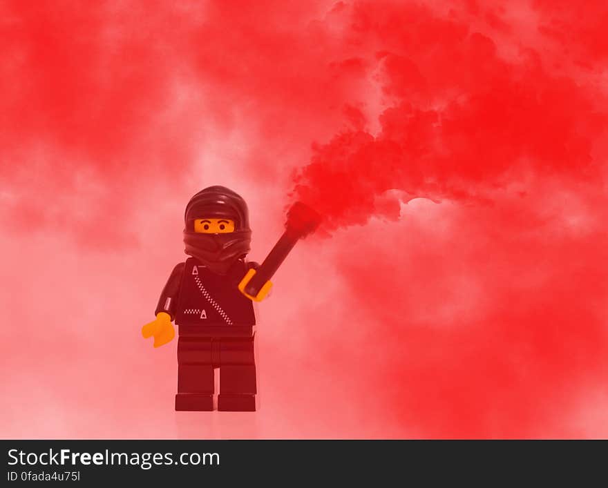 Lego Mini Figure Character in Red Smoke