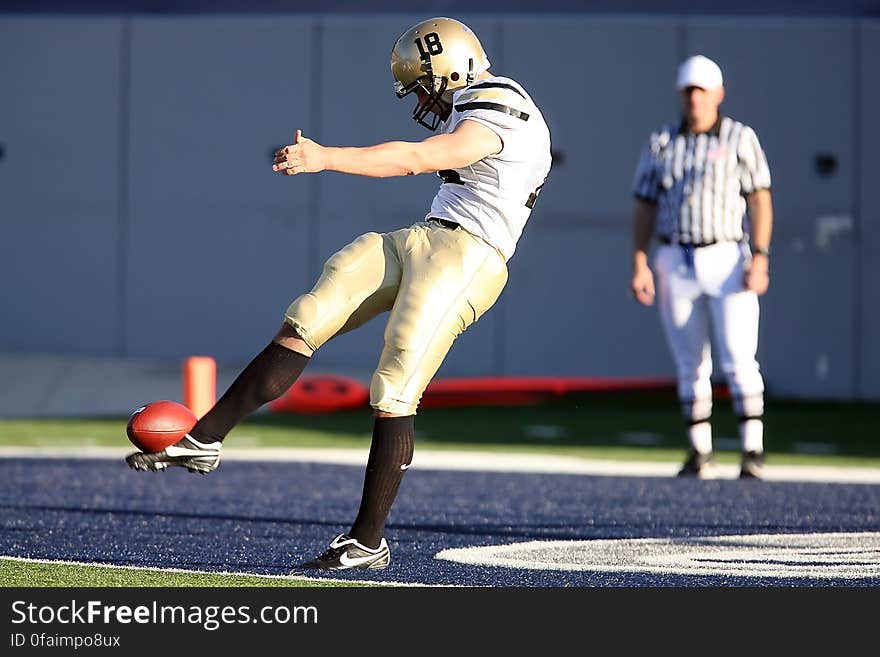 American Football Kicking the Ball