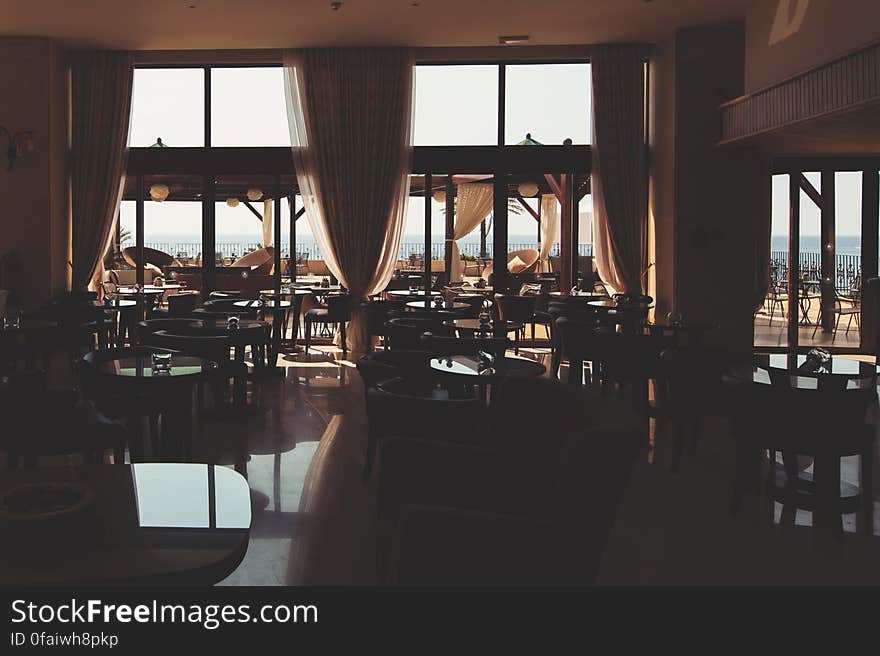 The interior of an empty stylish restaurant. The interior of an empty stylish restaurant.