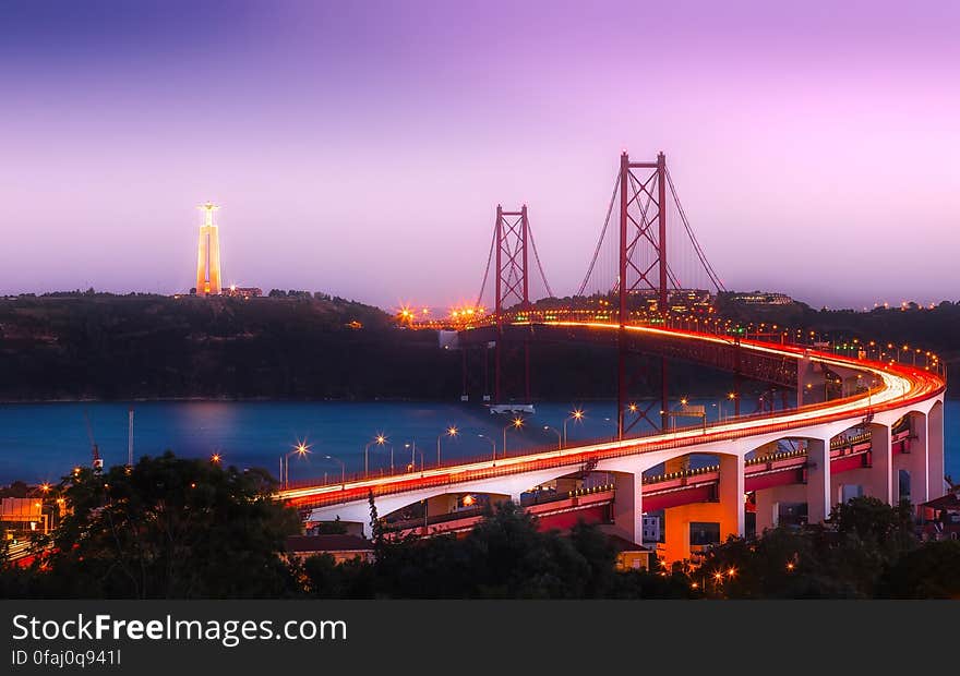 The Vasco da Gama Bridge, a bridge flanked that spans the Tagus River in in Lisbon, Portugal.