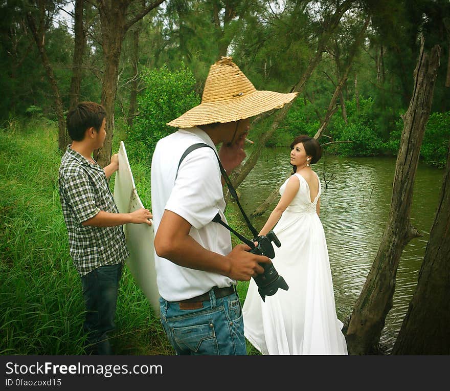 We bring photographer with us to shoot our outdoor wedding pictures. and Sometimes there will be a gaffer around the photographer. Tainan, Taiwan. We bring photographer with us to shoot our outdoor wedding pictures. and Sometimes there will be a gaffer around the photographer. Tainan, Taiwan.