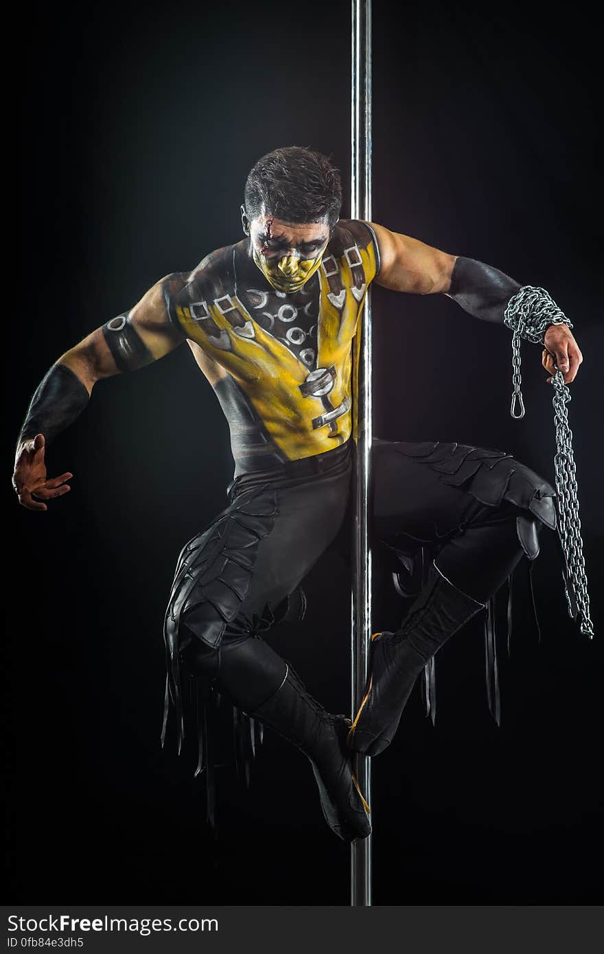 On the pole bodyart Scorpion from Mortal Kombat