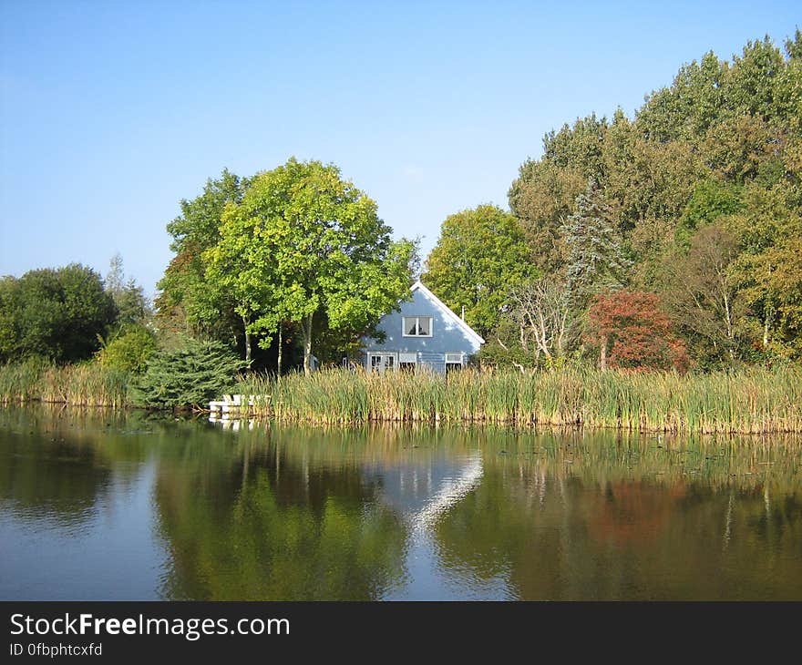 Blue house just south of Ouderkerk aan de Amstel, the Netherlands. Photograph taken on October 6 2007. Blue house just south of Ouderkerk aan de Amstel, the Netherlands. Photograph taken on October 6 2007.