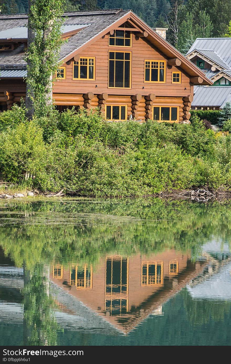 chalet reflected - -whistler-nikon1v2-30-110mm-20150624-DSC_0112