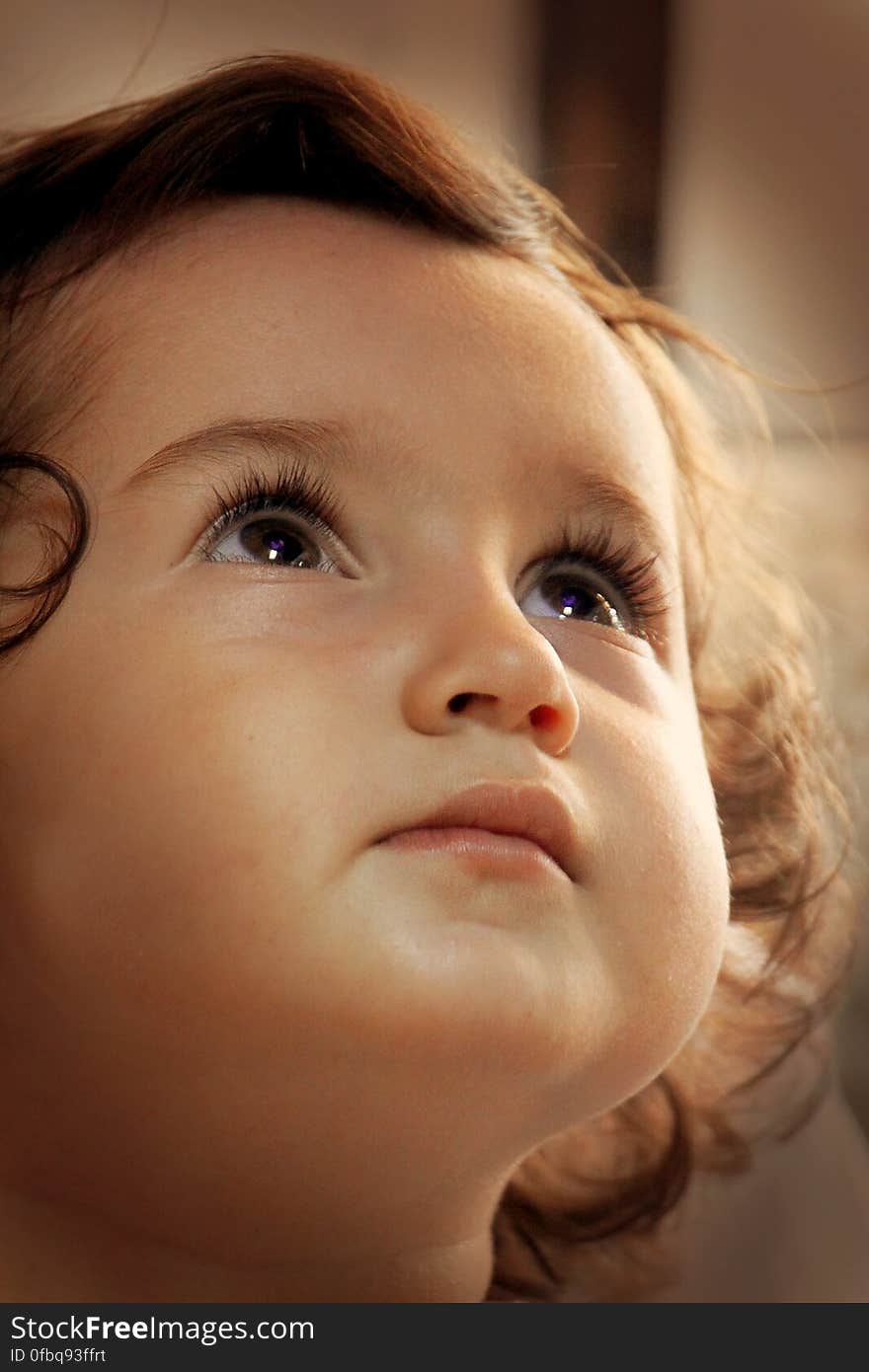 Close up portrait of young girl indoors.