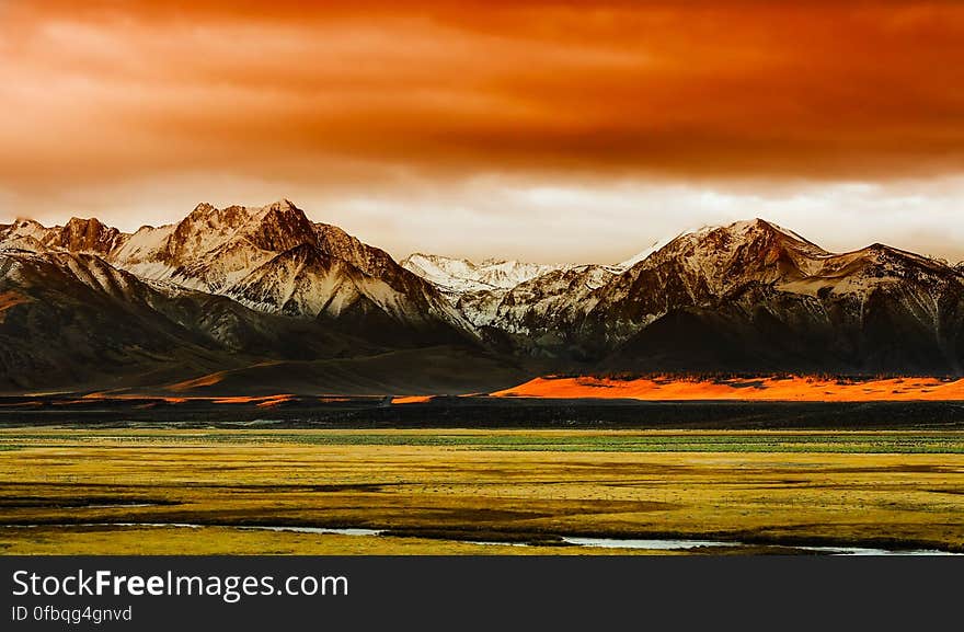 Sunset over mountains and field in California. Sunset over mountains and field in California.