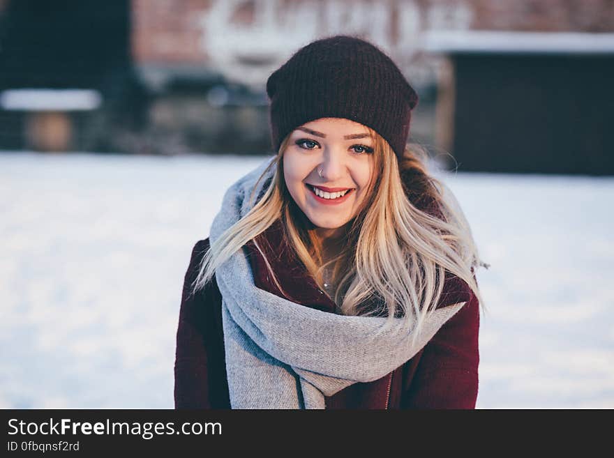 Woman Looking at City in Winter