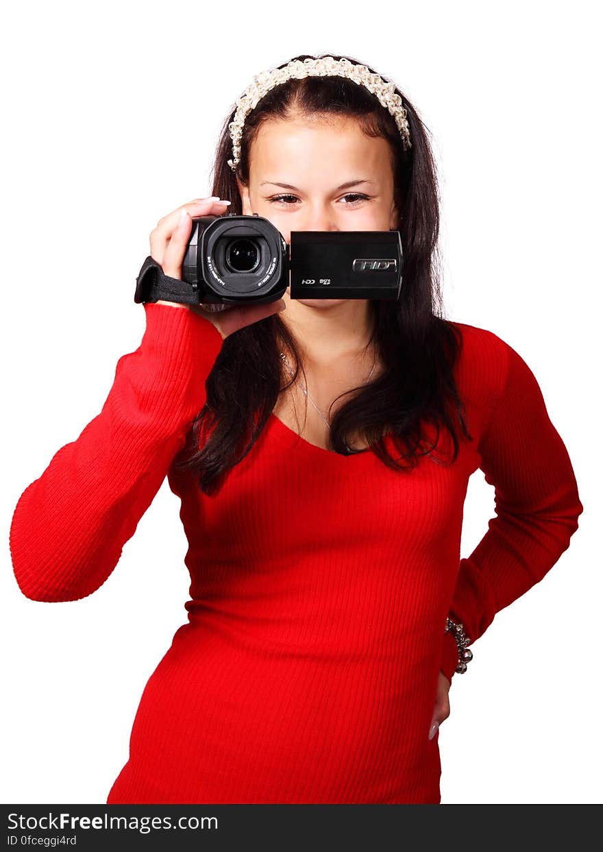 Woman Holding a Black Video Camera