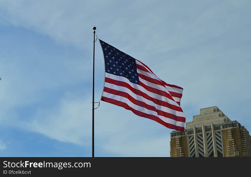 America Flag Under Blue Sky at Daytime