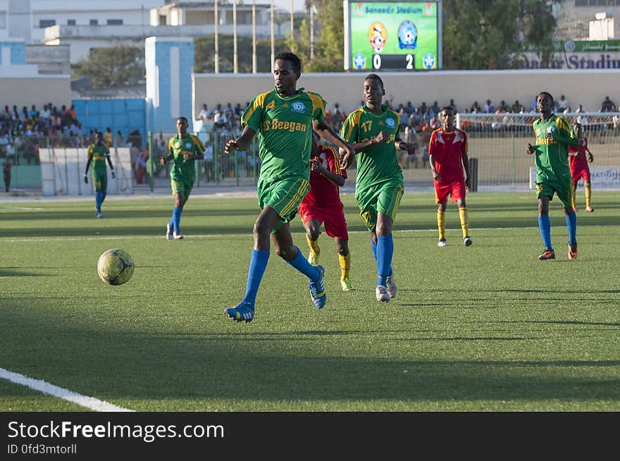 A Heegan player attempts to reach a ball before it gets out during a game between Heegan and Horseed football clubs at Banadir Stadium on 31st January 2014. AU UN IST PHOTO / David Mutua. A Heegan player attempts to reach a ball before it gets out during a game between Heegan and Horseed football clubs at Banadir Stadium on 31st January 2014. AU UN IST PHOTO / David Mutua