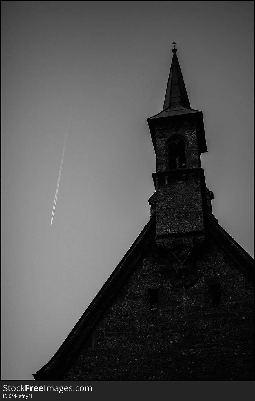 Plane flying past the catacomb chapel in Salzburg. Plane flying past the catacomb chapel in Salzburg