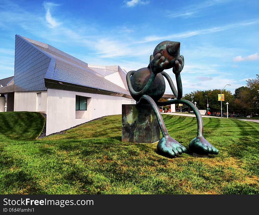 Crying Giant, a bronze sculpture by Tom Otterness, at the Kemper Museum of Contemporary Art in Kansas City, Missouri. Taken during our 2015 Western road trip. Others from this trip are in the Album www.flickr.com/photos/thadz/albums/72157660032324601 www.kemperart.org/collection/crying-giant If you decide to use this image under the CC attribution setting, please do let me know where you&#x27;ve used it by leaving a link in the comments below and add this link to your product: goo.gl/fjdIV5 . Enjoy!