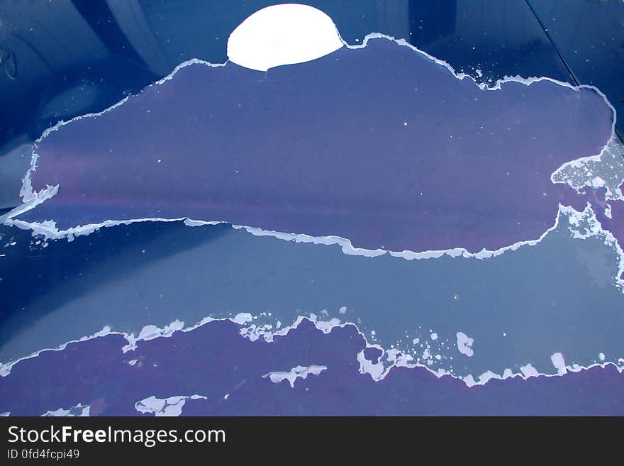 cloud with moon &#x28;peeling paint on car&#x29;