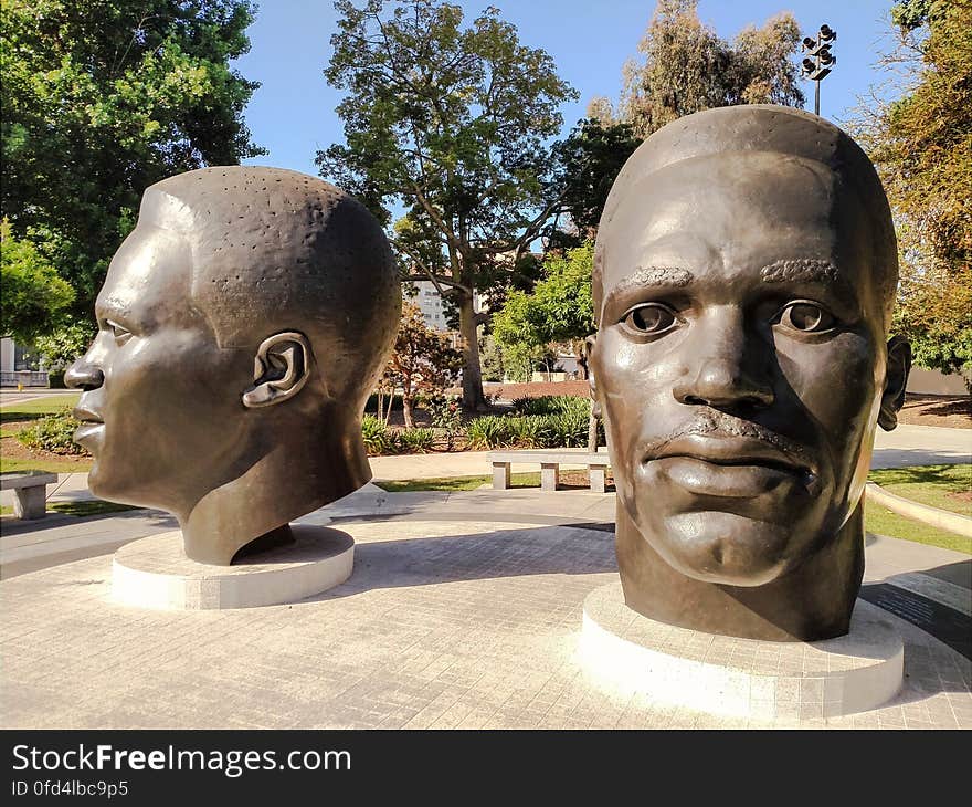 Jackie and Mack Robinson were famous African American athletes from Pasadena, California. These massive bronze busts commemorate them and are on Garfield Avenue in Pasadena, California across the way from City Hall. Day 118 of my 366 Project I have made this a Creative Commons dedication, in deference to the artists. See the link: articles.latimes.com/1997/nov/07/local/me-51230. Jackie and Mack Robinson were famous African American athletes from Pasadena, California. These massive bronze busts commemorate them and are on Garfield Avenue in Pasadena, California across the way from City Hall. Day 118 of my 366 Project I have made this a Creative Commons dedication, in deference to the artists. See the link: articles.latimes.com/1997/nov/07/local/me-51230