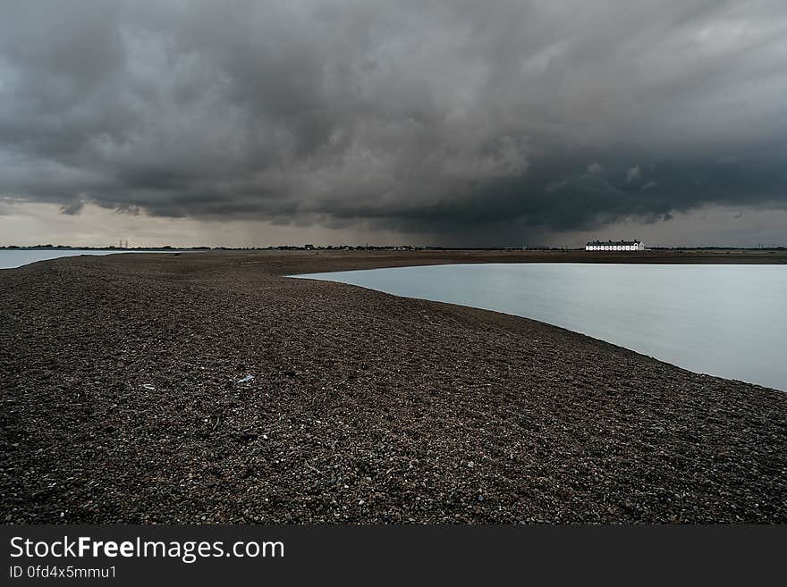 Big skies over Shingle Street in Suffolk, England. Big skies over Shingle Street in Suffolk, England.