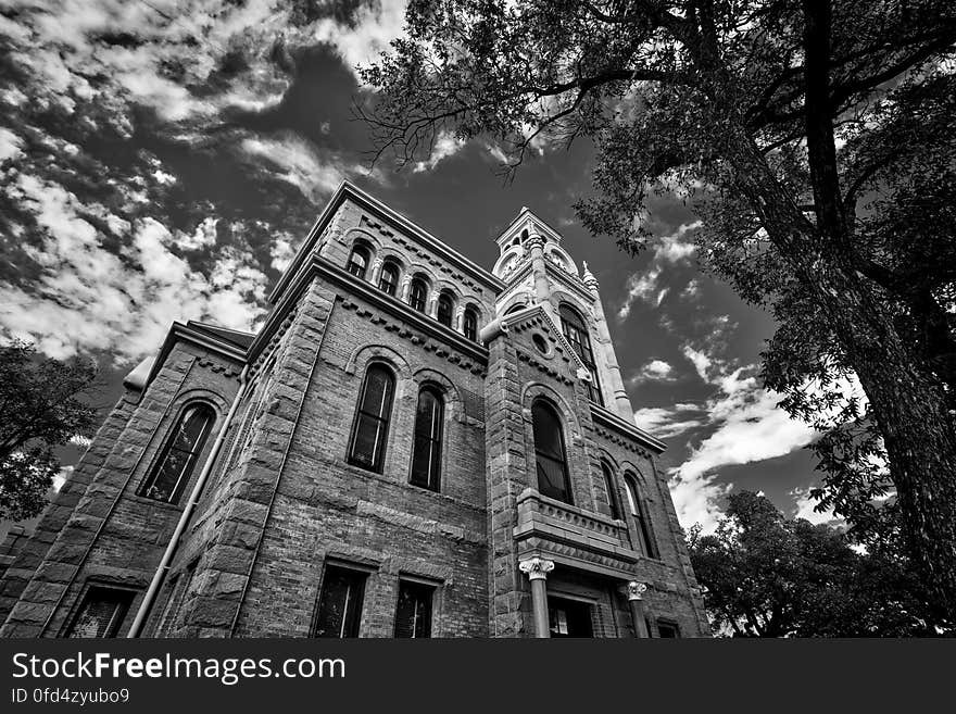 At over one hundred years old, Llanoâ€™s courthouse, designed in the Romanesque Revival style by architect Arthur O. Watson, wears its age well. Its sandstone, marble, brick, and granite exterior still manage to engage the eye and its massive rectangular presence with corner pavilions and clock tower are remarkably well-preserved for a building of 1893. At over one hundred years old, Llanoâ€™s courthouse, designed in the Romanesque Revival style by architect Arthur O. Watson, wears its age well. Its sandstone, marble, brick, and granite exterior still manage to engage the eye and its massive rectangular presence with corner pavilions and clock tower are remarkably well-preserved for a building of 1893.