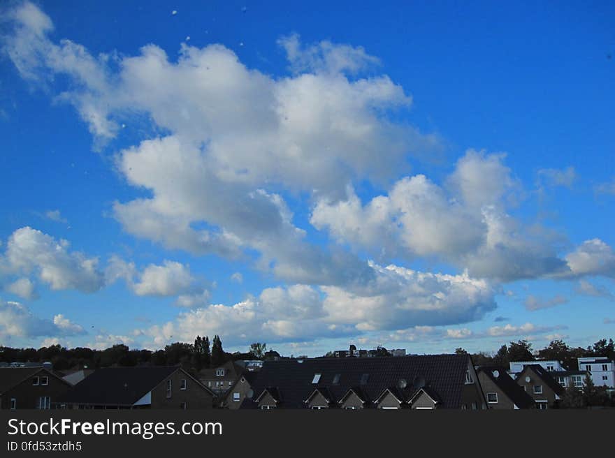 Some fast moving clouds in the afternoon sky. Some fast moving clouds in the afternoon sky.