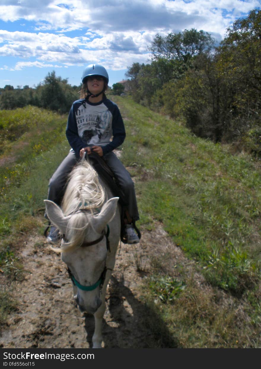 My little bro went horse riding with me, on a sweet horse named Caresse. He realy enjoyed it, and I was surprised that he was not tired after riding for a whole day! &#x28;Taken in Camargue&#x29;. My little bro went horse riding with me, on a sweet horse named Caresse. He realy enjoyed it, and I was surprised that he was not tired after riding for a whole day! &#x28;Taken in Camargue&#x29;