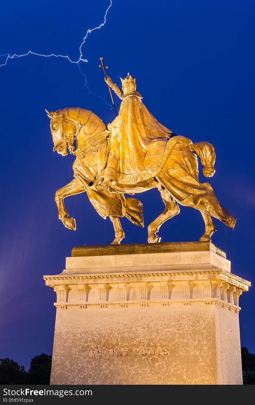 Statue of King Louis IX of France located in front of the Saint Louis Art Museum at Forest Park. This was made during what turned out to be a rare occurrence in 2012......a rain storm. Technically this is not a true &#x22;Blue Hour&#x22; photograph because it was made later in the evening. The blue color is a result from the lightning reflecting off the storm clouds. Statue of King Louis IX of France located in front of the Saint Louis Art Museum at Forest Park. This was made during what turned out to be a rare occurrence in 2012......a rain storm. Technically this is not a true &#x22;Blue Hour&#x22; photograph because it was made later in the evening. The blue color is a result from the lightning reflecting off the storm clouds.