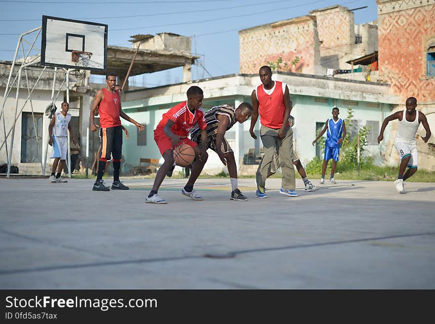 Basketball players play a game on a court in Mogadishu, Somalia, on June 6. Banned under the extremist group, Al Shabaab, Basketball is once again making a resurgence in Mogadishu. Today at least a dozen teams in the city play in a league and both men and women are coming out to play the sport. AU UN IST PHOTO / TOBIN JONES. Basketball players play a game on a court in Mogadishu, Somalia, on June 6. Banned under the extremist group, Al Shabaab, Basketball is once again making a resurgence in Mogadishu. Today at least a dozen teams in the city play in a league and both men and women are coming out to play the sport. AU UN IST PHOTO / TOBIN JONES