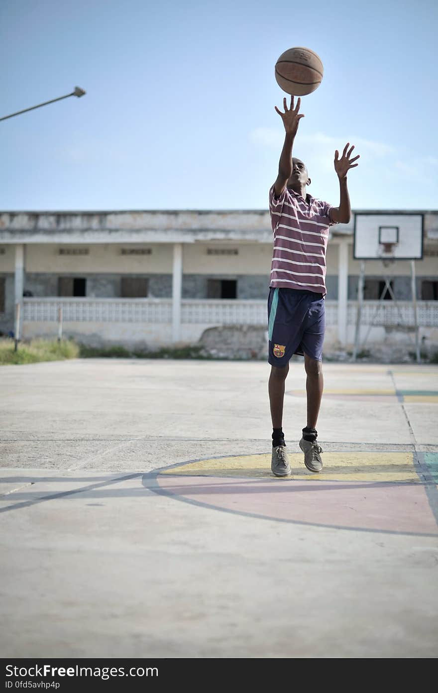 A boy practices his shot on a basketball court in Mogadishu, Somalia, on June 6. Banned under the extremist group, Al Shabaab, Basketball is once again making a resurgence in Mogadishu. Today at least a dozen teams in the city already play in a league and both men and women are coming out to play the sport. AU UN IST PHOTO / TOBIN JONES. A boy practices his shot on a basketball court in Mogadishu, Somalia, on June 6. Banned under the extremist group, Al Shabaab, Basketball is once again making a resurgence in Mogadishu. Today at least a dozen teams in the city already play in a league and both men and women are coming out to play the sport. AU UN IST PHOTO / TOBIN JONES