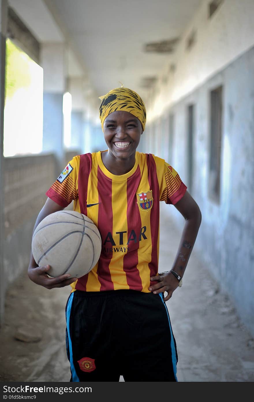 A young Somali girl holds a basketball during a practice session in Mogadishu on June 6. Banned under the extremist group, Al Shabaab, Basketball is once again making a resurgence in Mogadishu. Today at least a dozen teams in the city play in a league and both men and women are coming out to play the sport. AU UN IST PHOTO / TOBIN JONES. A young Somali girl holds a basketball during a practice session in Mogadishu on June 6. Banned under the extremist group, Al Shabaab, Basketball is once again making a resurgence in Mogadishu. Today at least a dozen teams in the city play in a league and both men and women are coming out to play the sport. AU UN IST PHOTO / TOBIN JONES