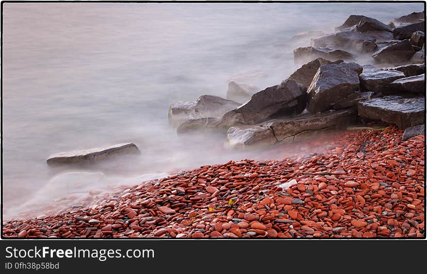 The red &#x22;stones&#x22; are actually broken clay bricks and tiles. The red &#x22;stones&#x22; are actually broken clay bricks and tiles.