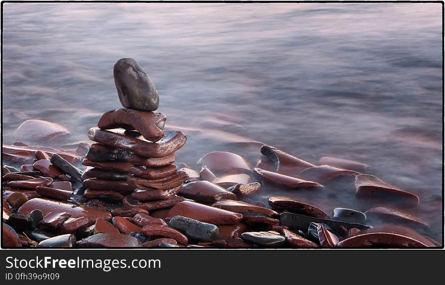 The red &#x22;stones&#x22; are actually broken clay bricks and tiles. The red &#x22;stones&#x22; are actually broken clay bricks and tiles.