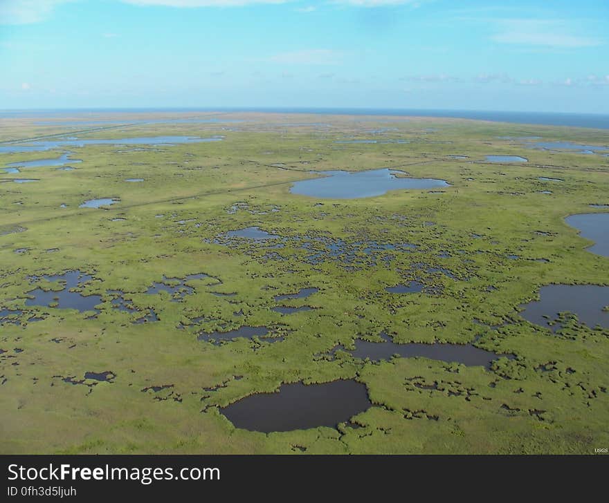 Happy Birthday Mississippi — Today&#x27;s your b-day &#x28;197 years young&#x29;. On this date in 1817, you became the 20th state in the Nation. While there&#x27;s &#x22;humpback humpback eyes&#x22; in this photo, we know there&#x27;s plenty of wildlife for us to dote upon. This is an aerial view of subsiding marshes in the Mississippi River Delta. This region contains vast areas of marshes, swamps, and barrier islands—important habitat for wildlife, as nursery grounds for marine life, and as protective buffers against storms and hurricanes. Unfortunately, rapid land subsidence due to sediment compaction and dewatering increases the rate of submergence in this deltaic system. Photo credit: Karen McKee, USGS.