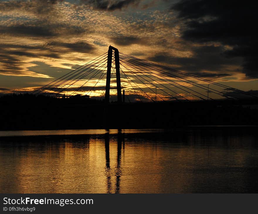 A single pylon bridge standing and looking handsom in the evening. A single pylon bridge standing and looking handsom in the evening.