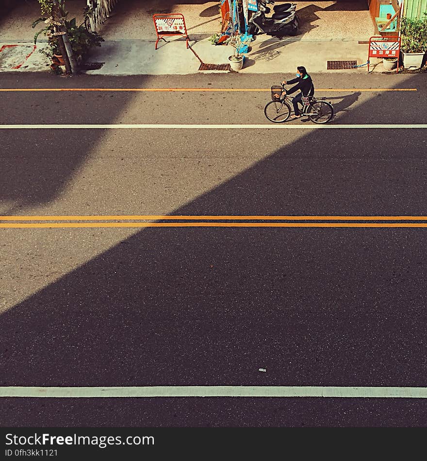 Shadow, bicycle and man. Processed with VSCO with acg preset