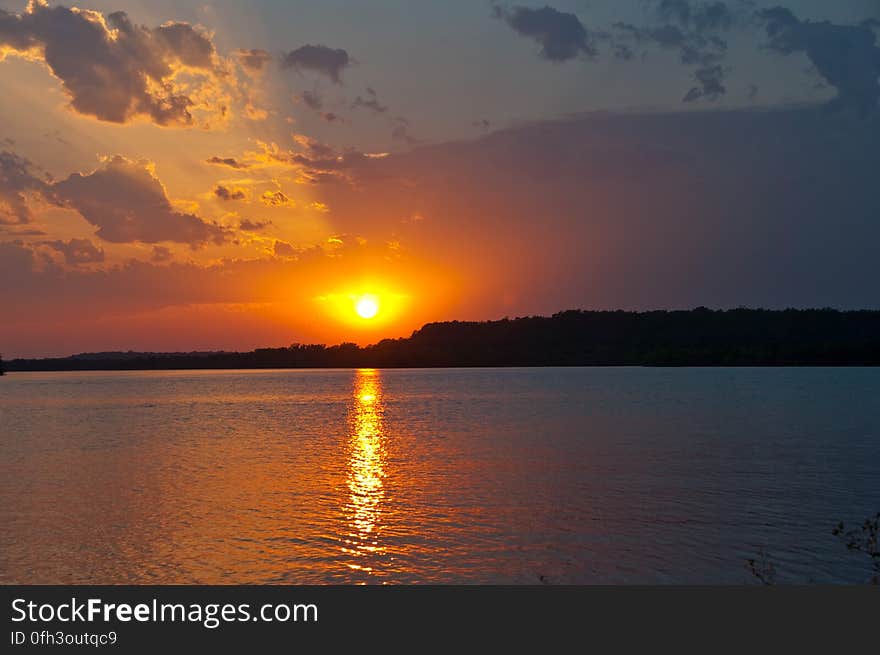 Sunset over Lake Oologah, Oklahoma, at the Blue Creek Campground where we spent the night. Read about our 2009 Summer Road Trip and view the entire photo collection on my blog. Sunset over Lake Oologah, Oklahoma, at the Blue Creek Campground where we spent the night. Read about our 2009 Summer Road Trip and view the entire photo collection on my blog.