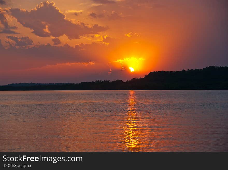 Sunset over Lake Oologah, Oklahoma, at the Blue Creek Campground where we spent the night. Read about our 2009 Summer Road Trip and view the entire photo collection on my blog. Sunset over Lake Oologah, Oklahoma, at the Blue Creek Campground where we spent the night. Read about our 2009 Summer Road Trip and view the entire photo collection on my blog.