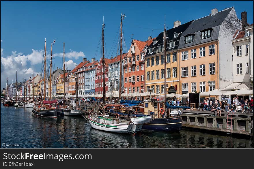 Nyhavn is a picturesque 17th century canal dug by Swedish prisoners. This was taken from the Nyhavnsbroen bridge. Nyhavn is a picturesque 17th century canal dug by Swedish prisoners. This was taken from the Nyhavnsbroen bridge.