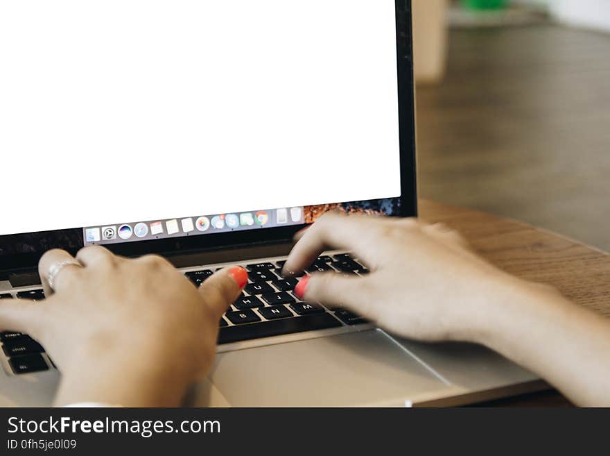 Close-up of Man Using Laptop