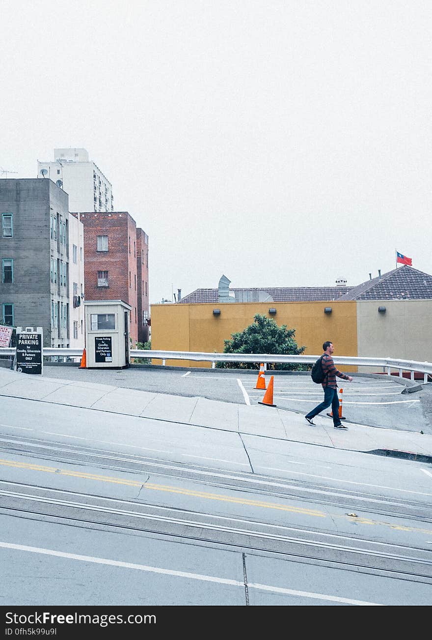 Man Walking on the Street