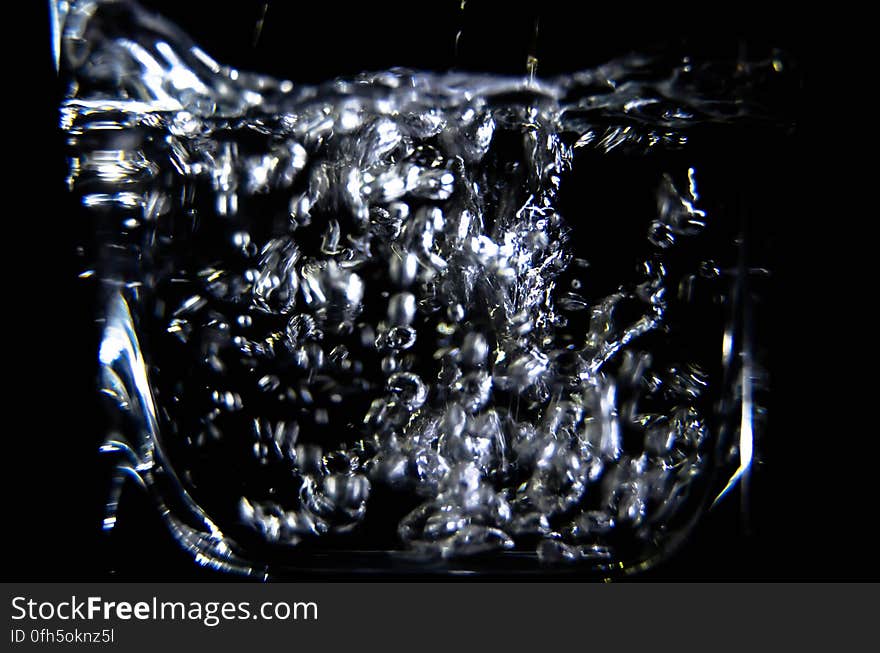 Close-up of Water Splashing Against Black Background