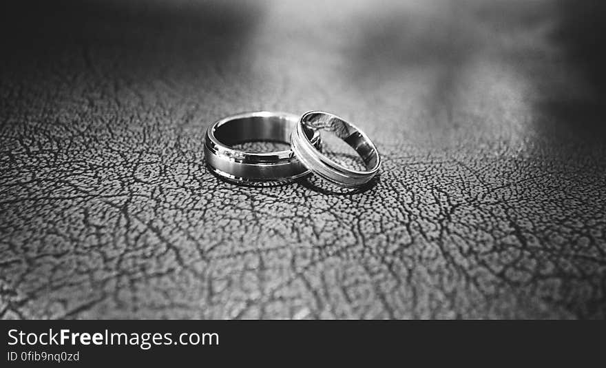 Close-up of Wedding Rings on Floor