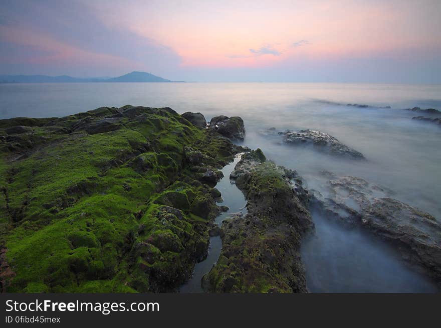 Scenic View of Sea at Sunset