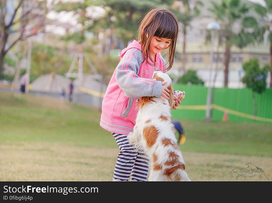 Portrait of a Smiling Young Woman With Dog