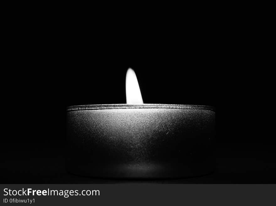 Close-up of Candle over Black Background