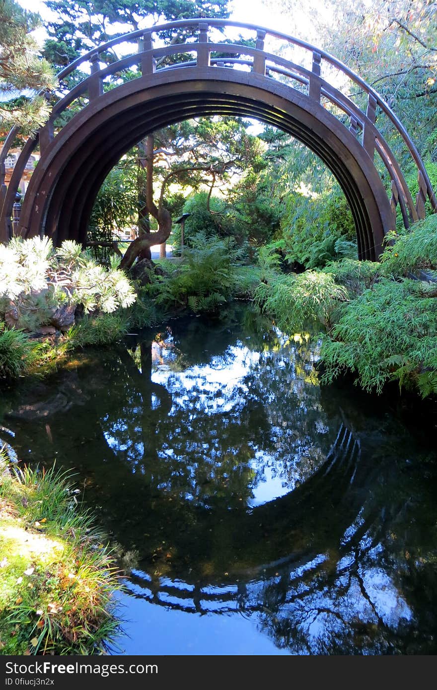 Japanese arched bridge with reflection