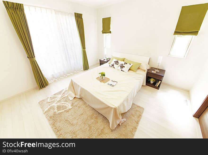 Elevated view of interior of luxurious modern bedroom.